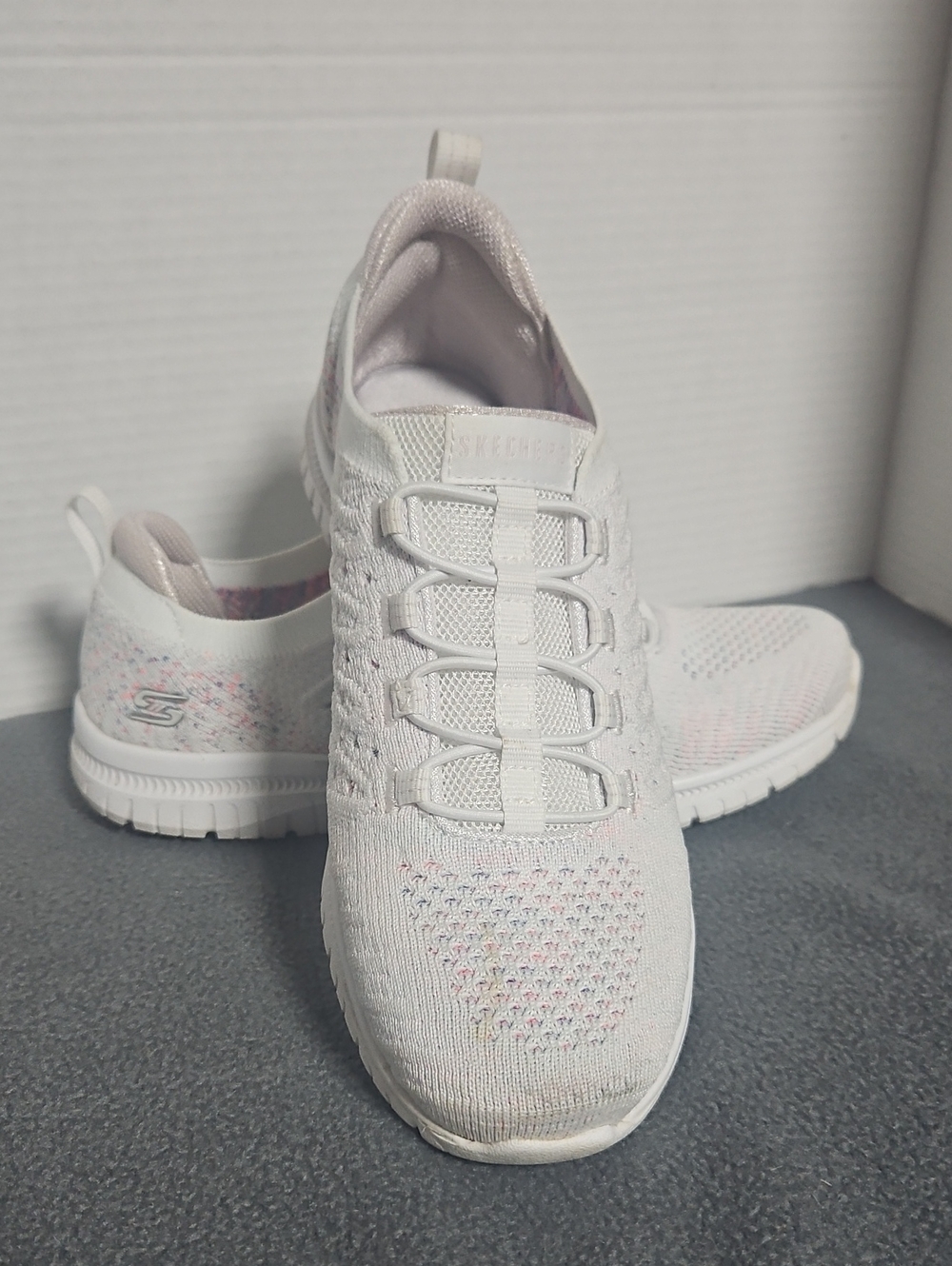 Skechers Women's White Knit Slip-On Sneakers with Subtle Pink Speckle